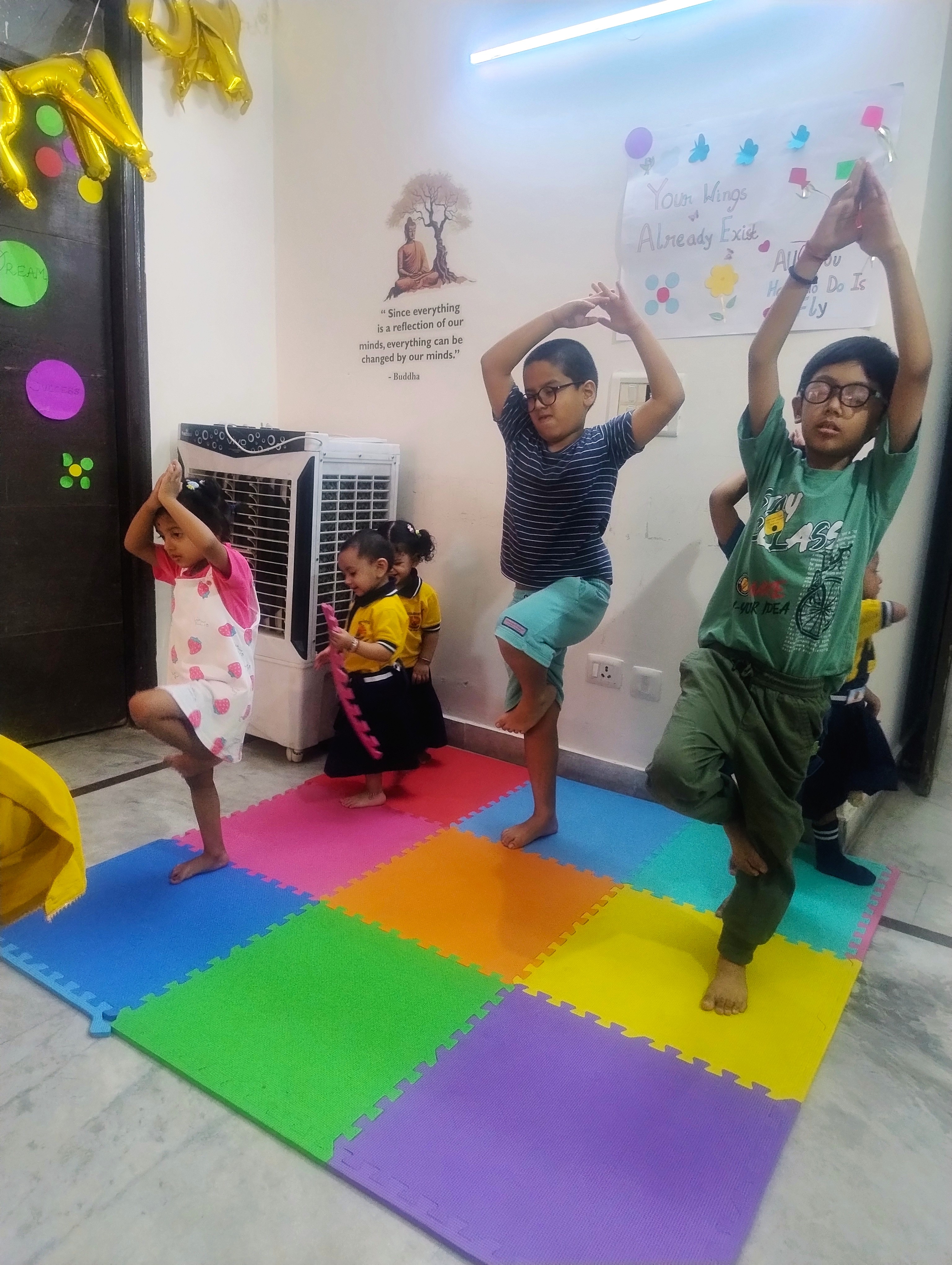 Three children engaged in a learning activity